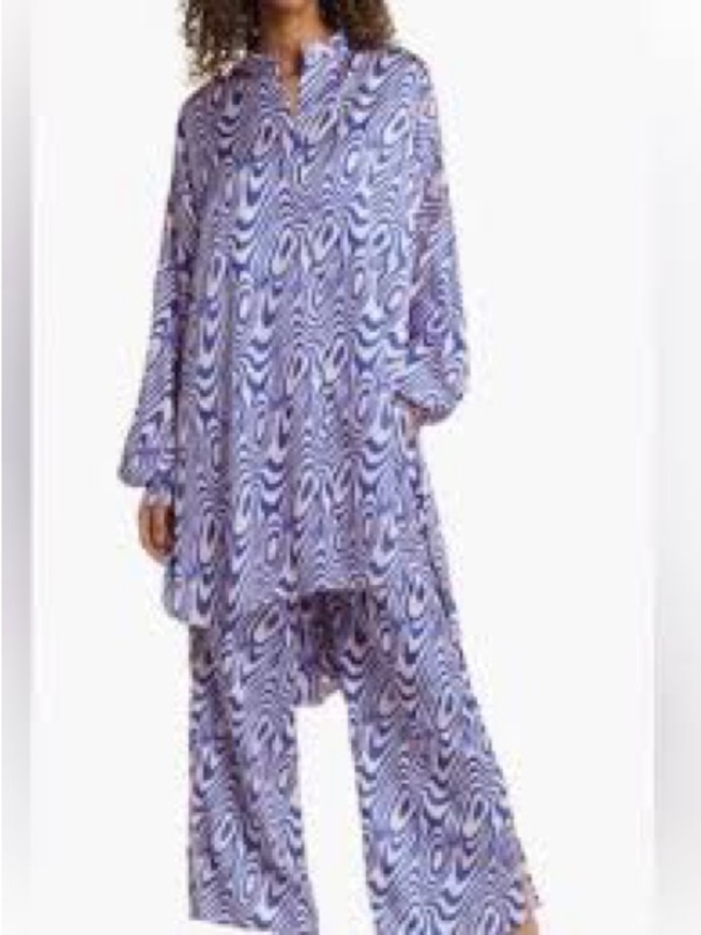 Dressed in LALA satin playsuit in blue swirl
